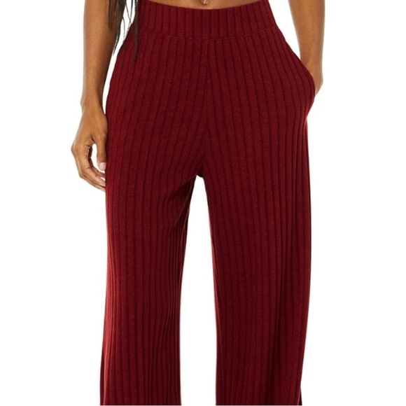 Alo Yoga Ribbed Take Comfort Wide Leg Pant in cranberry. - Picture 2 of 4